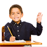 Elementary student raising his hand to be called on